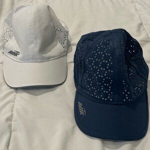 Pair of AVIA hats. 1 White. 1 Blue.